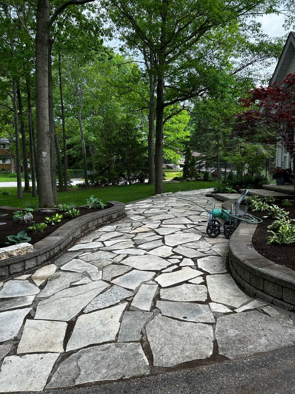 Natural stone patio and garden edging completed by Georgian Edge