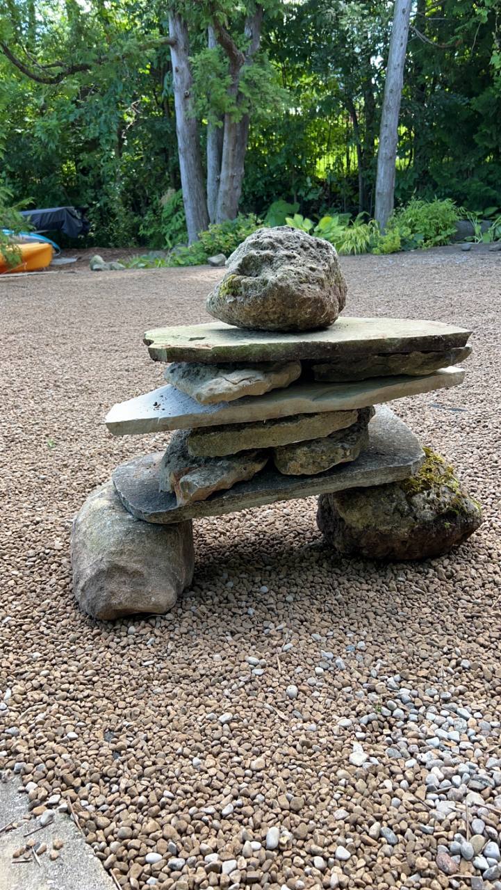 Decorative stone feature in a gravel garden